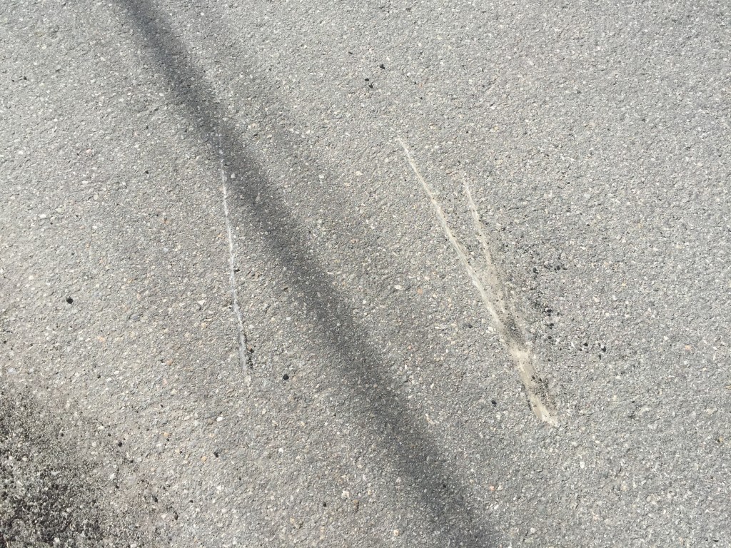 scratches we left in the pavement